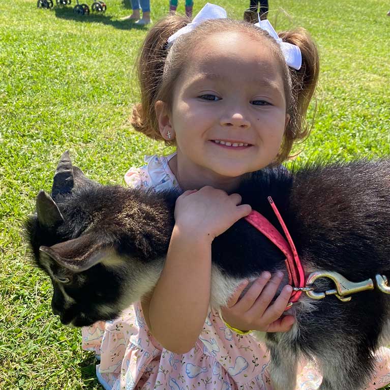 Meet and greet with our fuzzy farm friends at our petting zoo area!